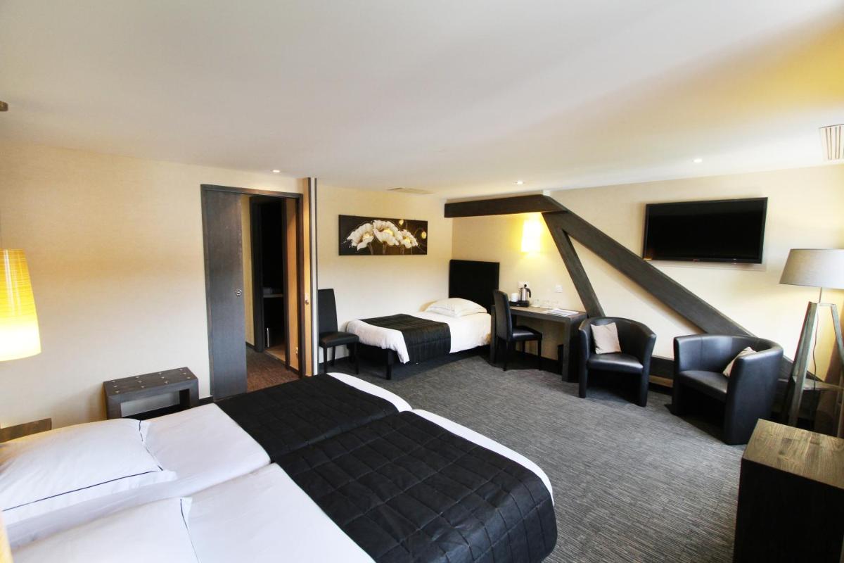 Un ou plusieurs lits dans un hébergement de l'établissement Hotel de la Jamagne & Spa