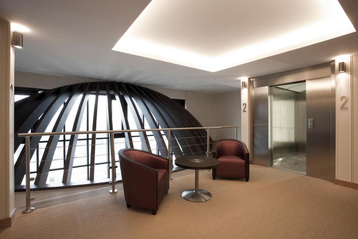 Coin salon dans l'établissement Best Western Plus Hotel des Francs