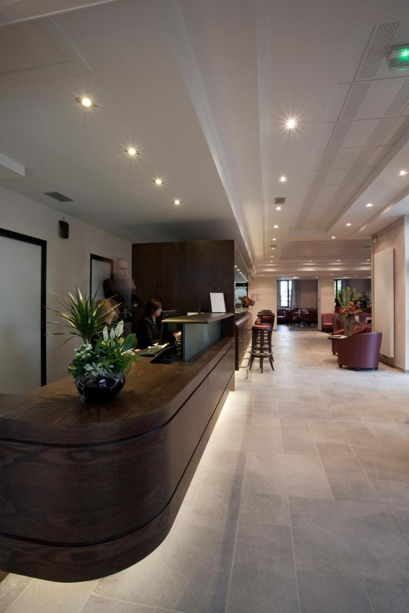 Coin salon dans l'établissement Best Western Plus Hotel des Francs