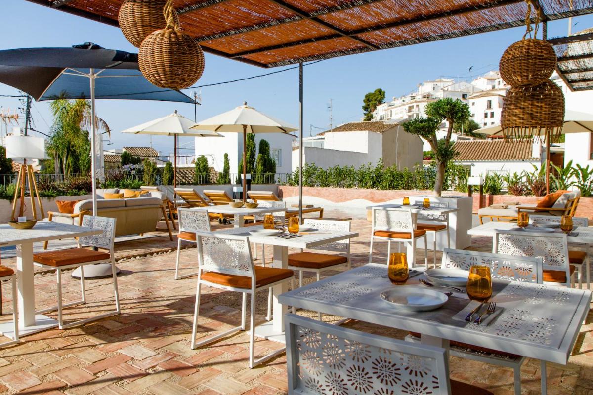 Un restaurante o sitio para comer en La Serena Boutique Hotel & Wellness - Altea