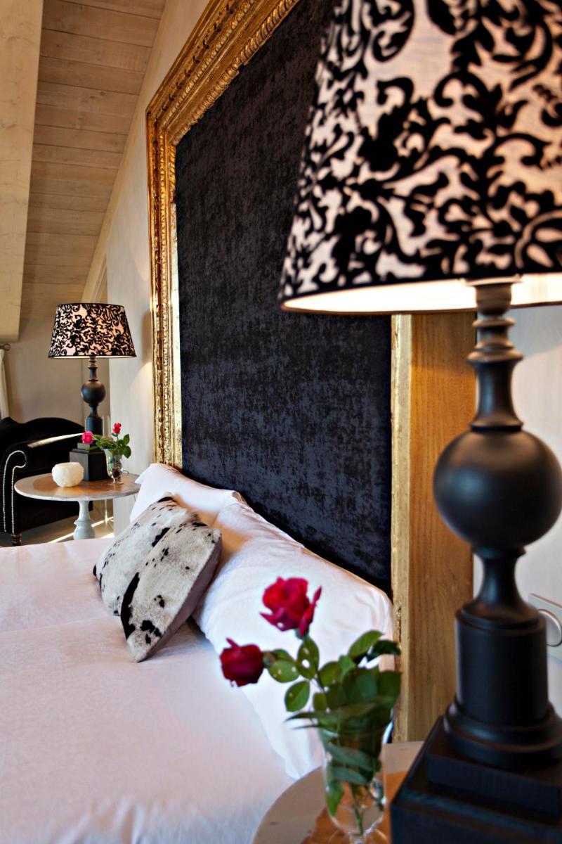 Cama o camas de una habitación en La Vella Farga Hotel