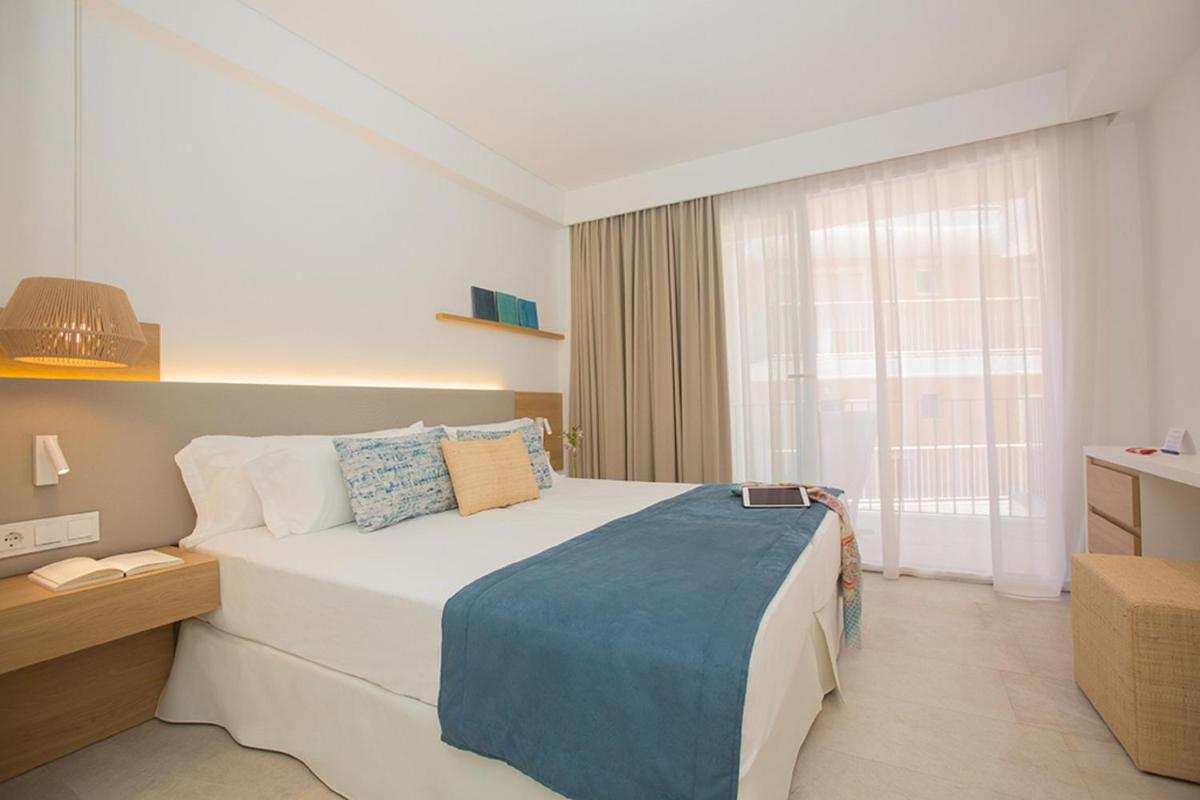 Cama o camas de una habitación en Myseahouse Flamingo - Adults Only 4* Sup