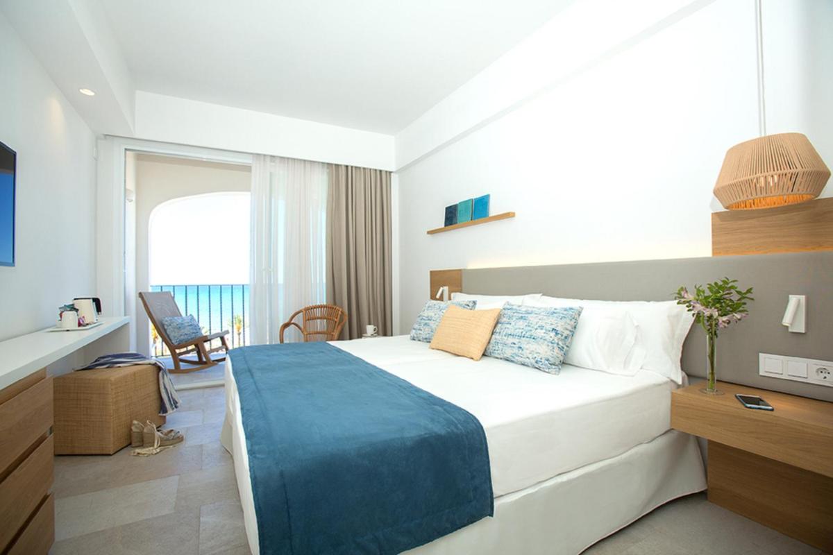 Cama o camas de una habitación en Myseahouse Flamingo - Adults Only 4* Sup