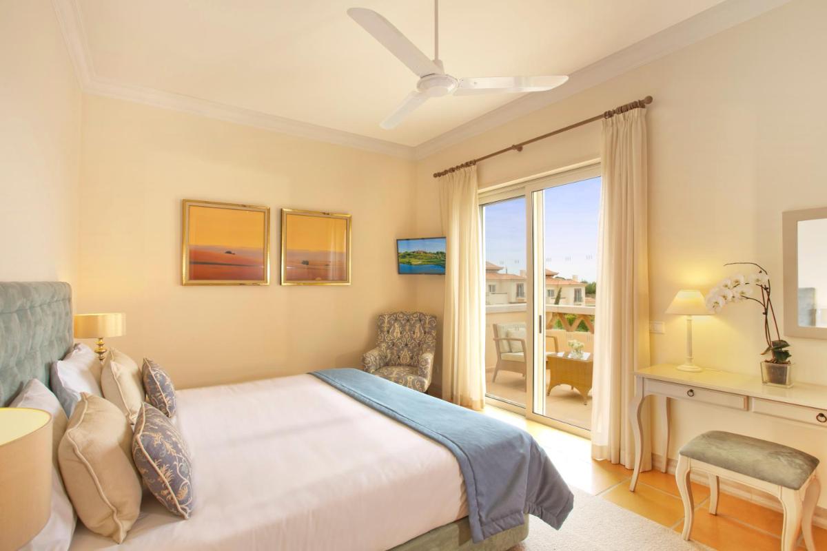 Uma cama ou camas num quarto em Monte Rei Golf & Country Club