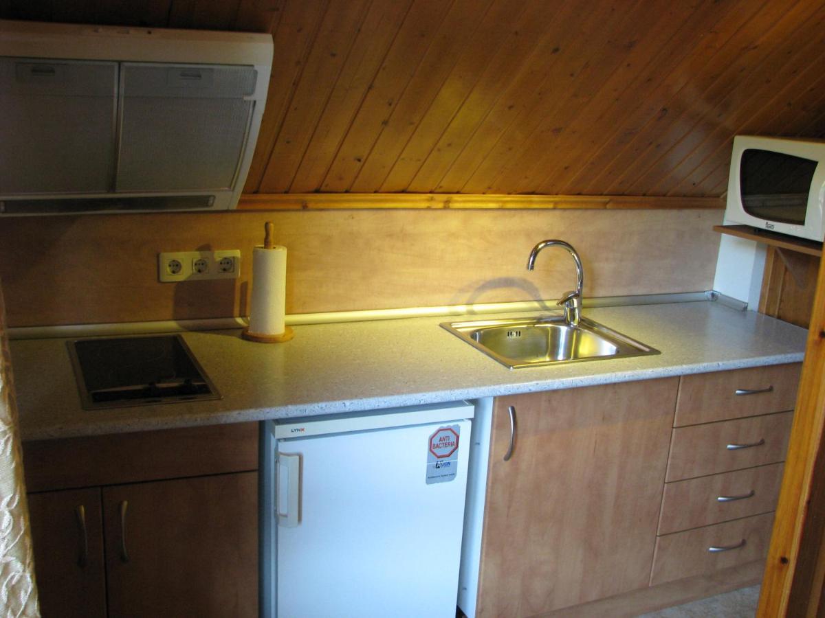 Una cocina o zona de cocina en Aparthotel Sarrato