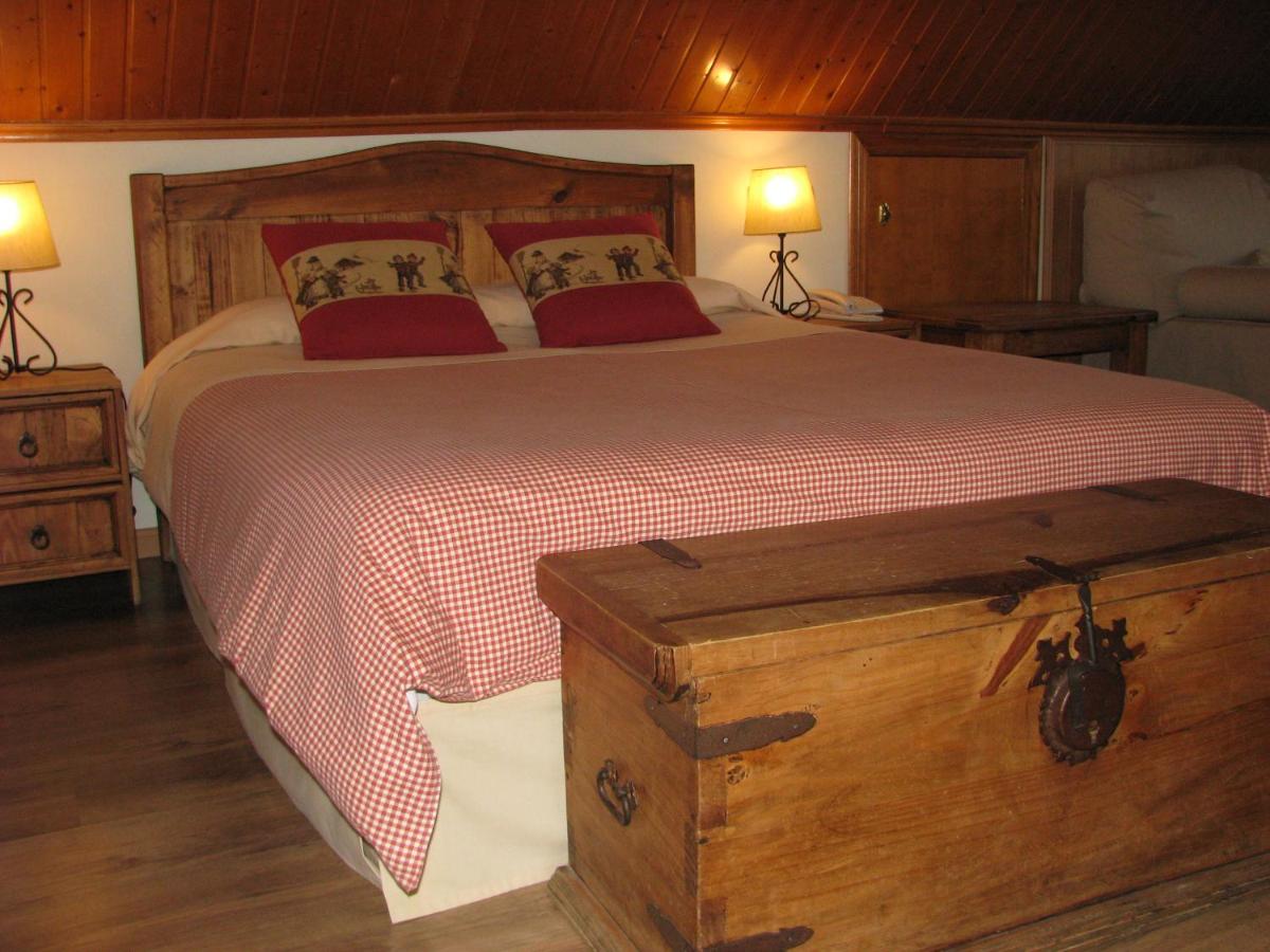 Cama o camas de una habitación en Aparthotel Sarrato