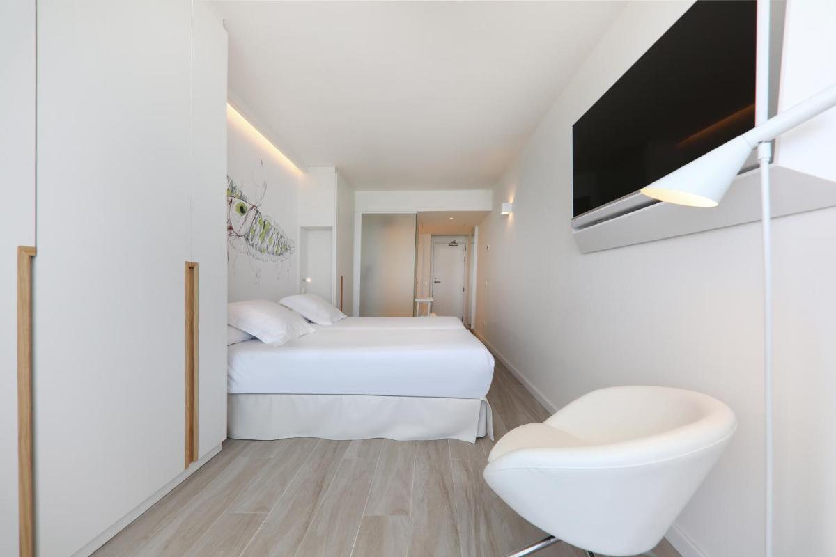 Cama o camas de una habitación en Iberostar Waves Bahía de Palma - Adults Only