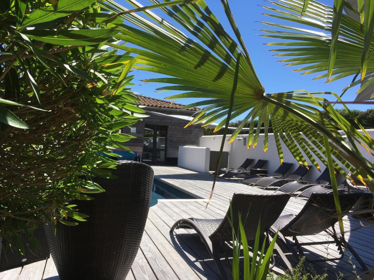 Photo de la galerie de l'établissement Elégance Suites Hôtel, au Bois-Plage-en-Ré