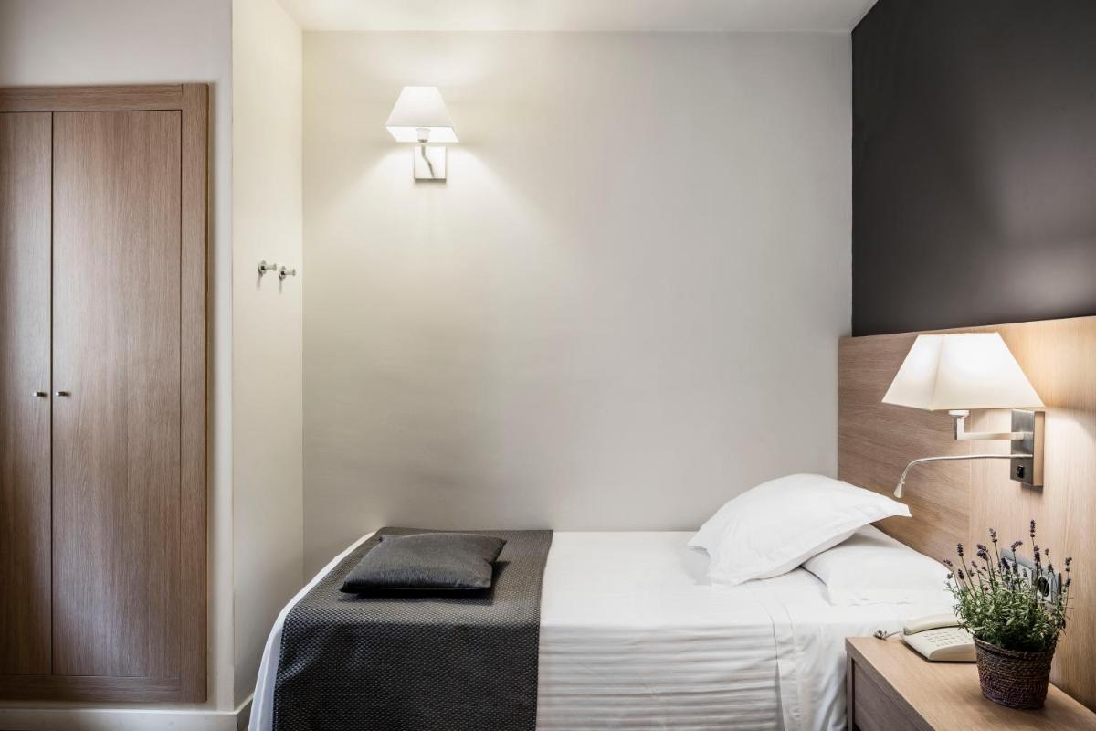 Cama o camas de una habitación en Balneari Termes Victòria