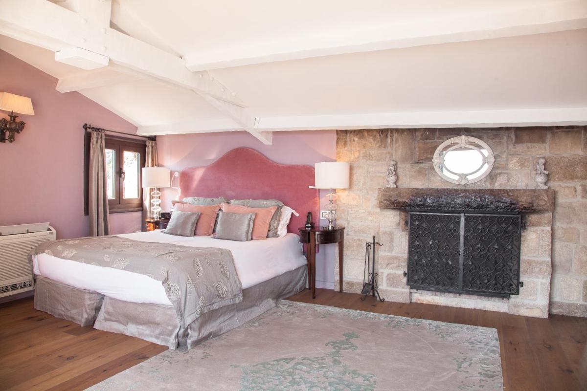 Un ou plusieurs lits dans un hébergement de l'établissement Chateau Eza