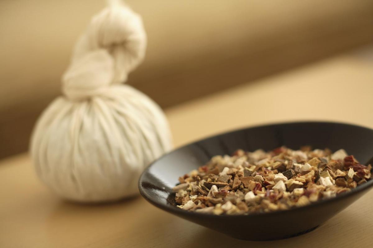 a bowl of granola next to a bowl of garlic at Hyatt Regency Lucknow Gomti Nagar in Lucknow