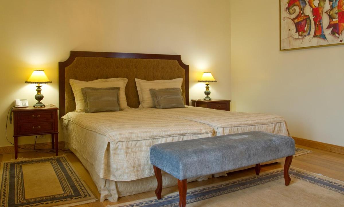 Uma cama ou camas num quarto em Hotel Quinta Bela S Tiago