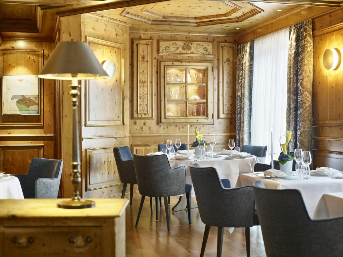 Ein Sitzbereich in der Unterkunft Colombi Hotel