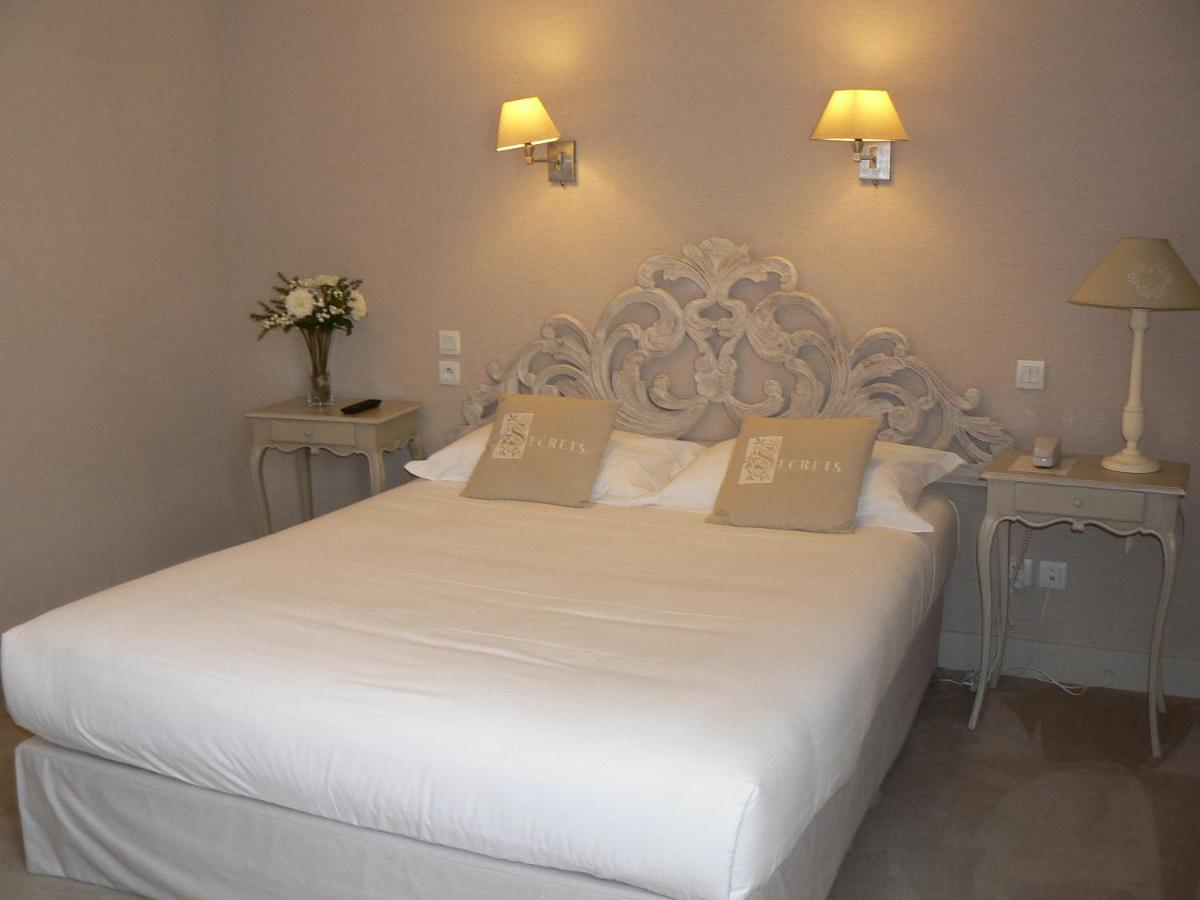 Un ou plusieurs lits dans un hébergement de l'établissement Hôtel 4 étoiles - Restaurants & Spa Périer Du Bignon