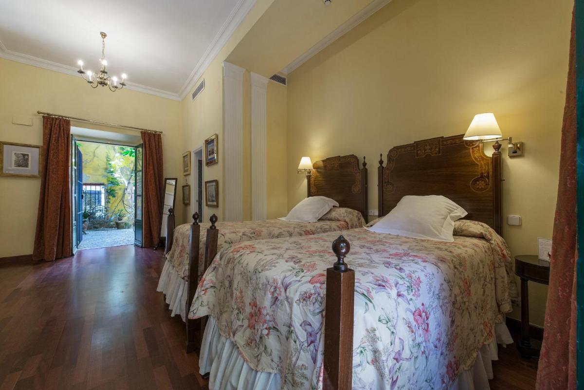 Cama o camas de una habitación en Hotel Las Casas de la Judería
