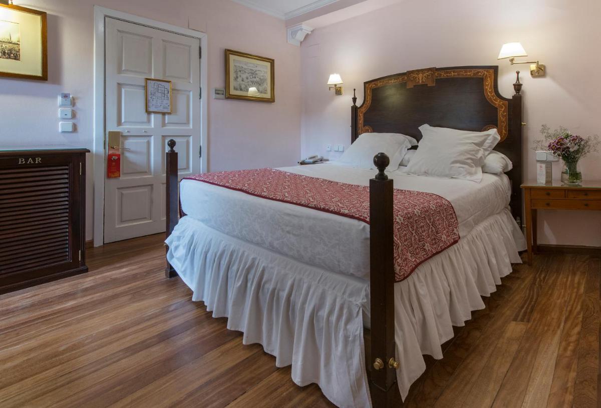 Cama o camas de una habitación en Hotel Las Casas de la Judería