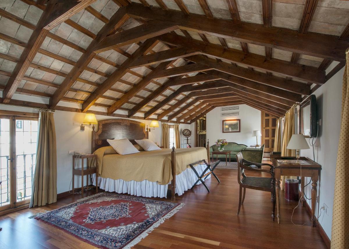 Cama o camas de una habitación en Hotel Las Casas de la Judería