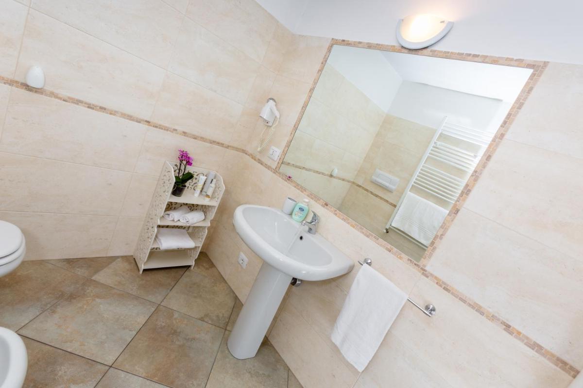Residence Rta La Rosa delle Dolomiti - Housity