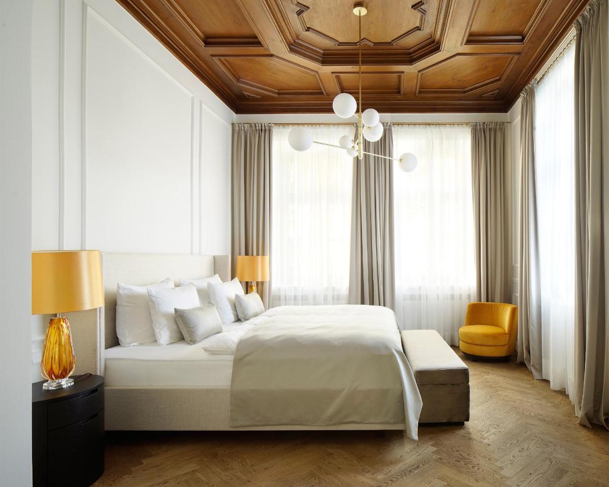 Ein Bett oder Betten in einem Zimmer der Unterkunft Das Tegernsee
