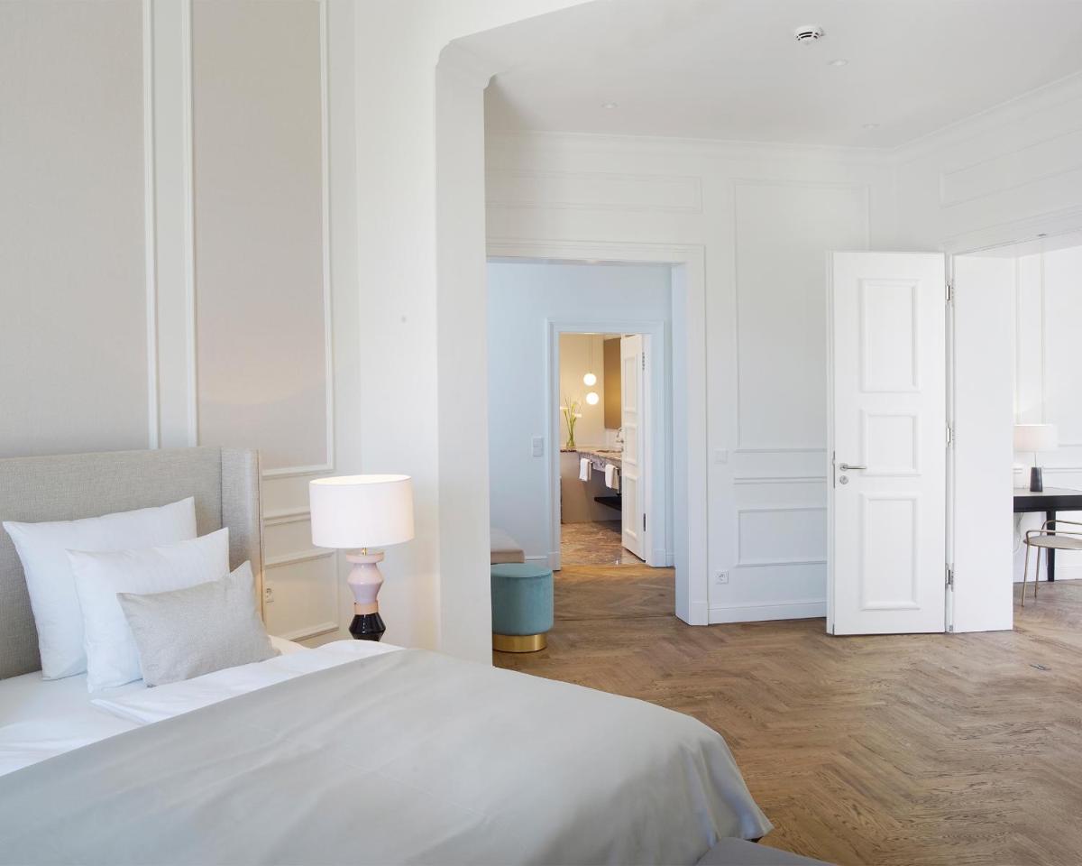 Ein Bett oder Betten in einem Zimmer der Unterkunft Das Tegernsee