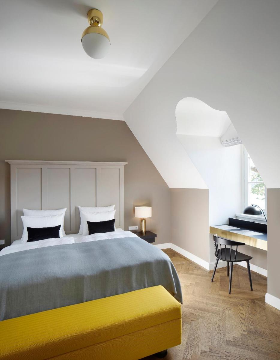Ein Bett oder Betten in einem Zimmer der Unterkunft Das Tegernsee
