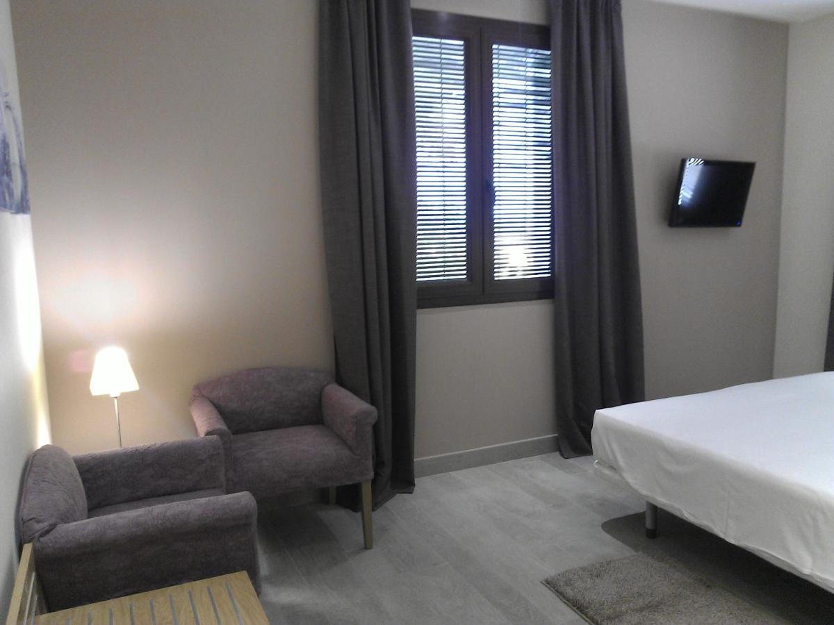 Cama o camas de una habitación en Hotel Balneario El Raposo