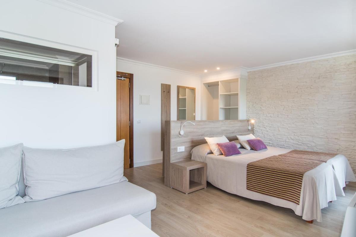 Cama o camas de una habitación en Hotel Na Taconera