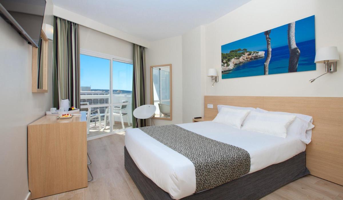 Cama o camas de una habitación en Hotel Samos