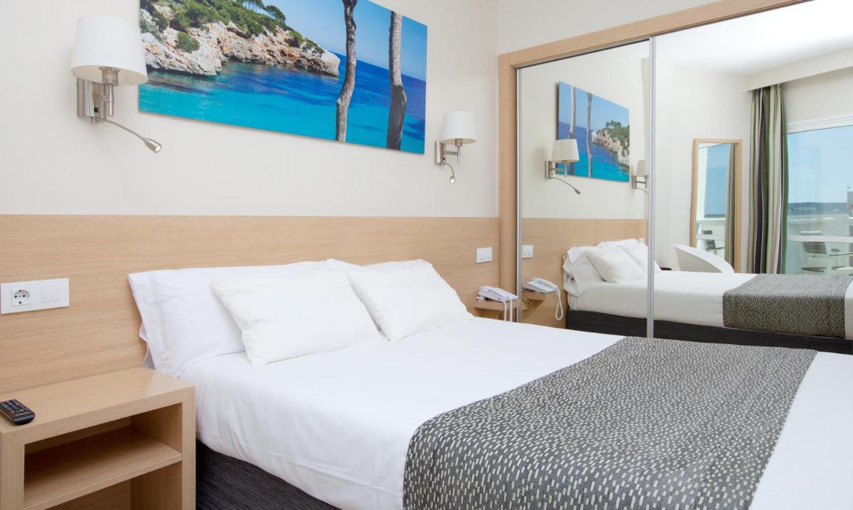 Cama o camas de una habitación en Hotel Samos