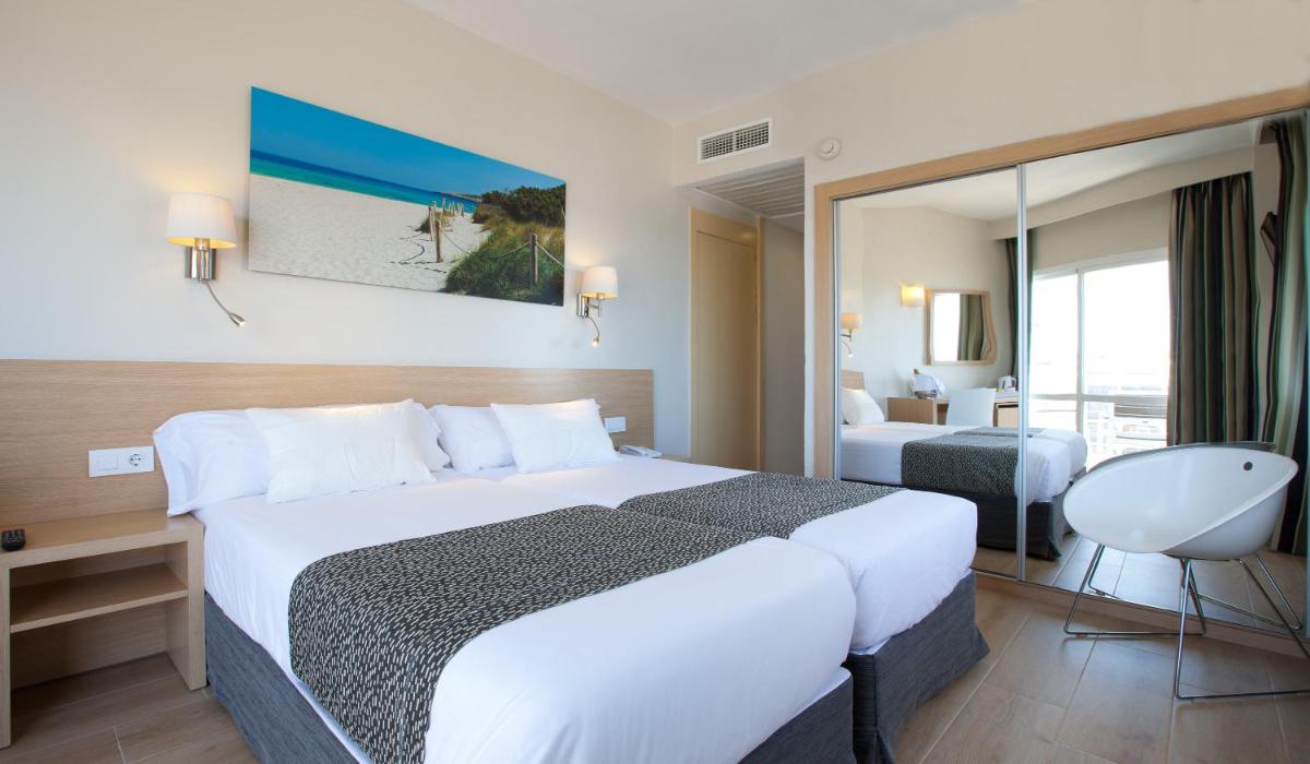 Cama o camas de una habitación en Hotel Samos