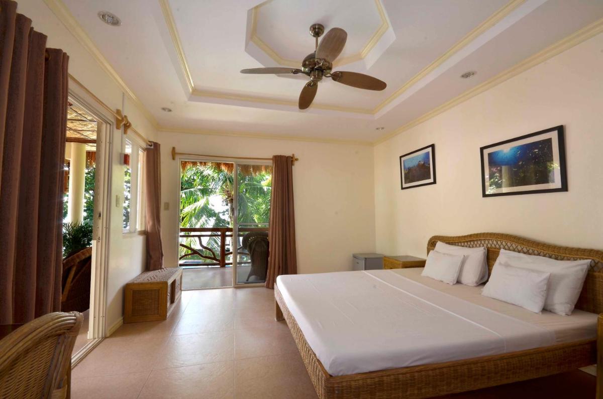 Mike's Dauin Dive Resort - Housity