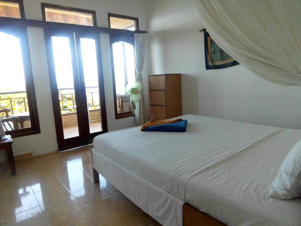 Sunrise Cafe Bungalows - Housity