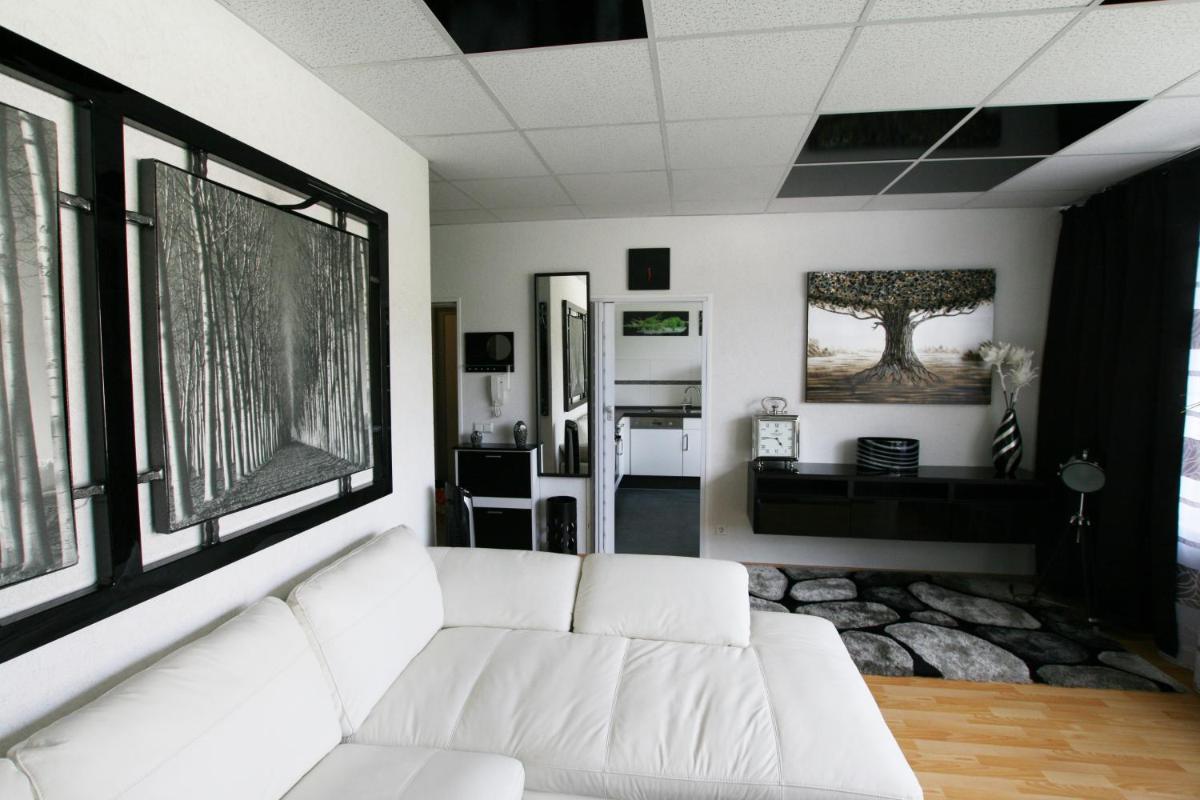Designerwohnung in Schwarz und Weiß - Housity
