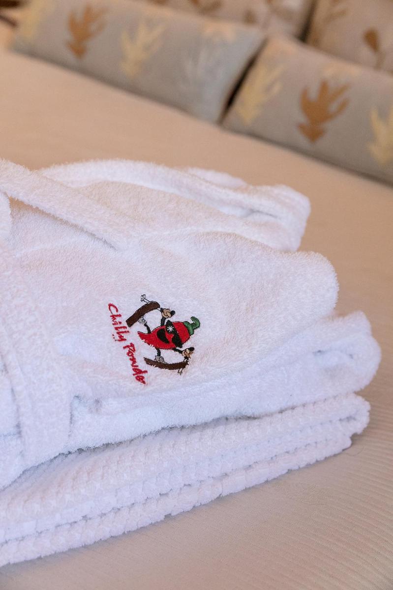 Un ou plusieurs lits dans un hébergement de l'établissement Hôtel et Chalet Au Coin Du Feu Chilly Powder