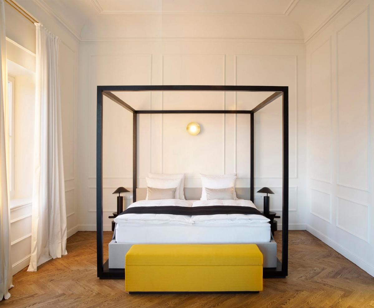 Ein Bett oder Betten in einem Zimmer der Unterkunft Das Tegernsee