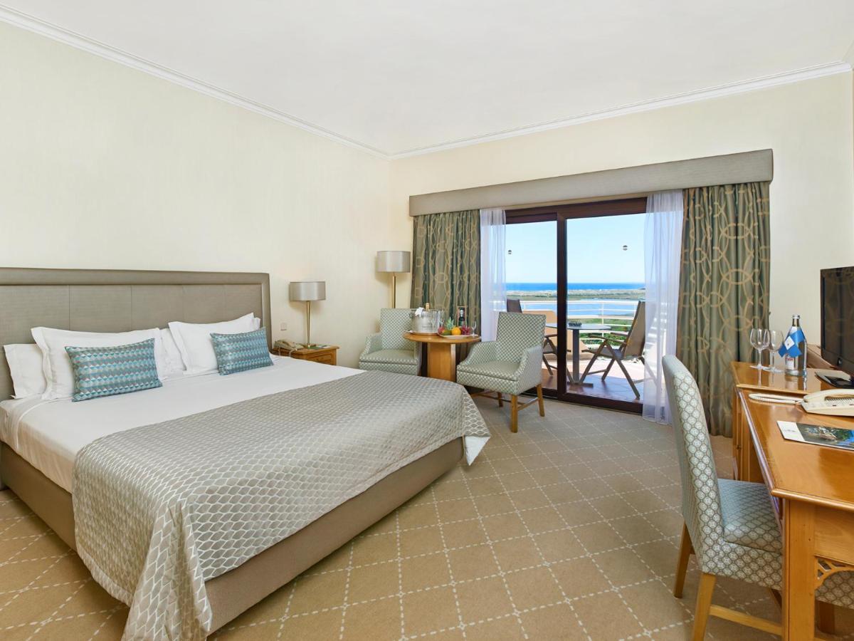 Uma cama ou camas num quarto em Hotel Quinta do Lago