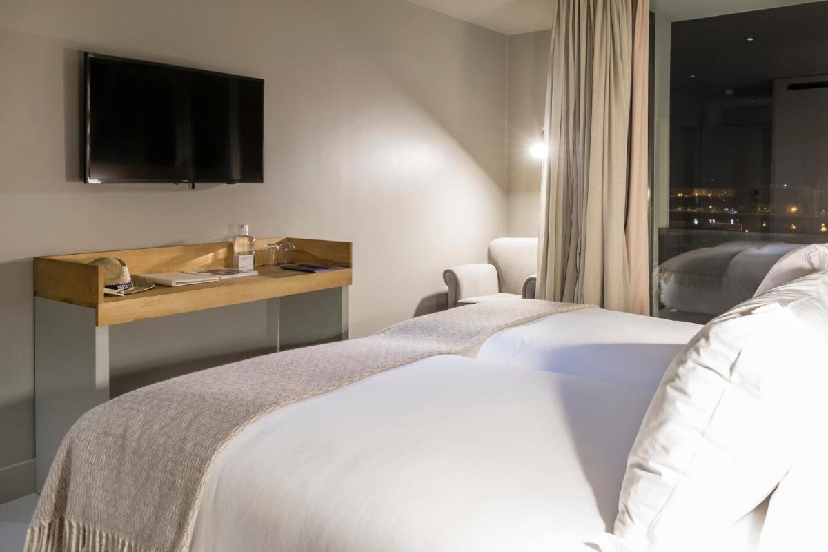 Uma cama ou camas num quarto em Villa C Boutique Hotel