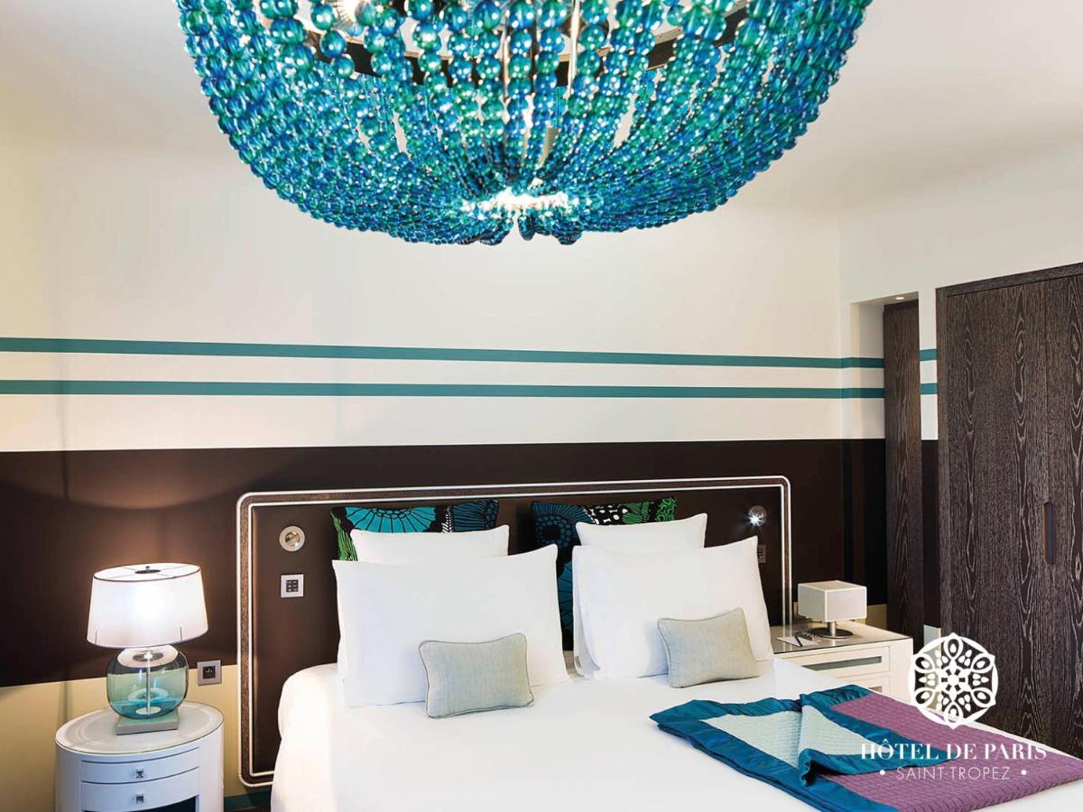 Un ou plusieurs lits dans un hébergement de l'établissement Hôtel de Paris Saint-Tropez