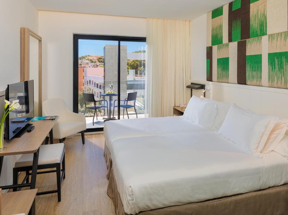 Cama o camas de una habitación en H10 Casa del Mar