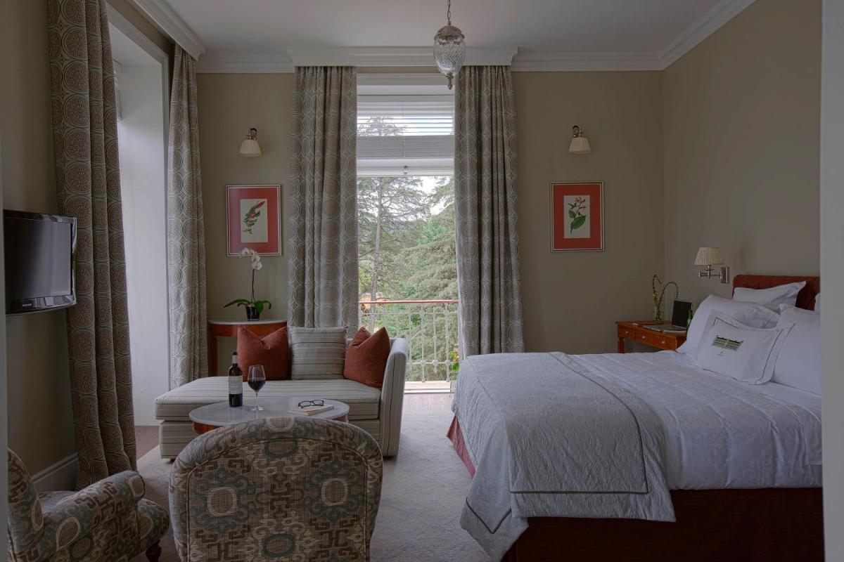 Uma cama ou camas num quarto em Vidago Palace