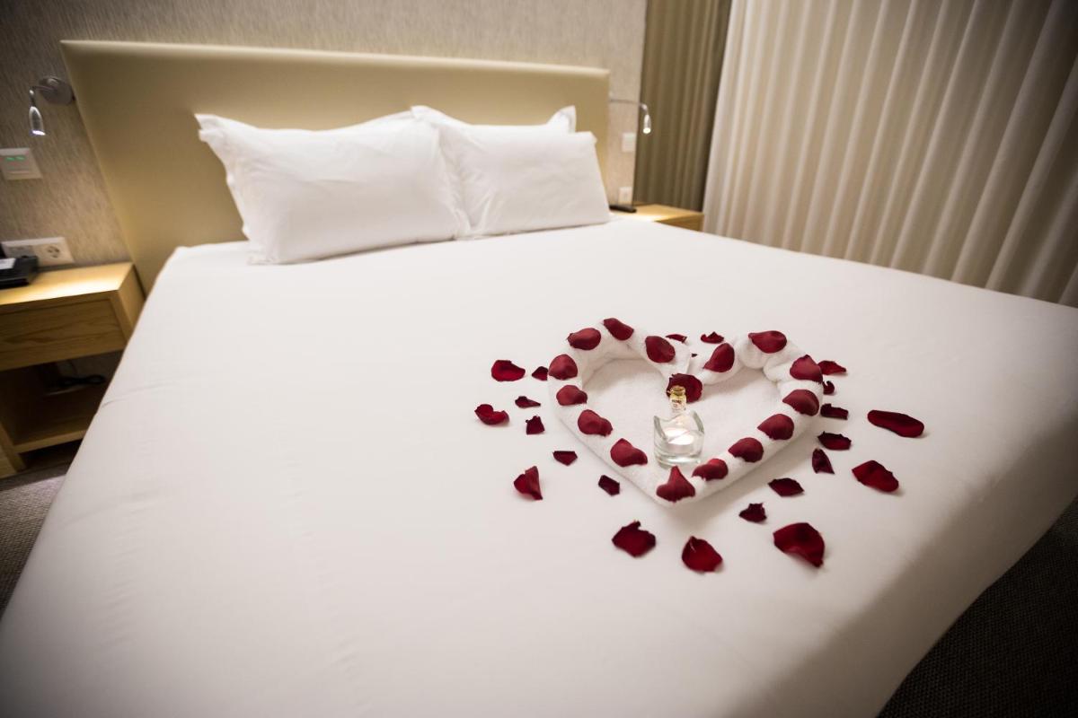 Uma cama ou camas num quarto em LAM Hotel Celorico de Basto