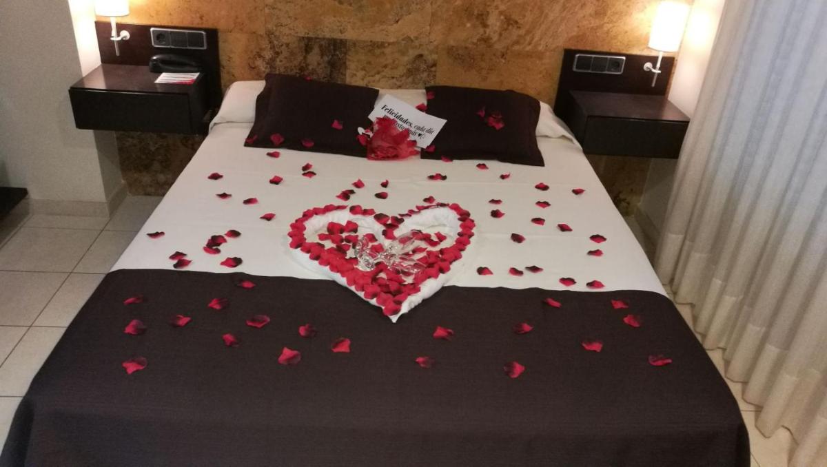 Cama o camas de una habitación en Hotel Spa Pinar del Mar