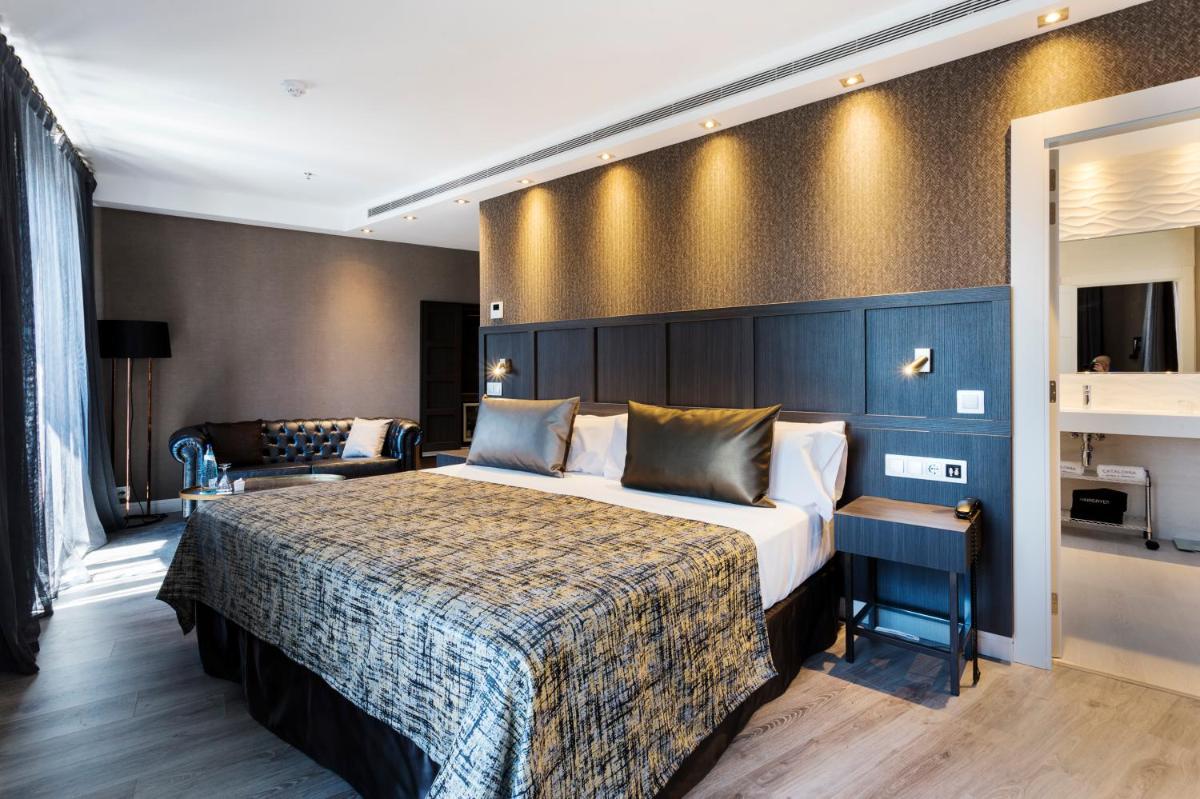 Cama o camas de una habitación en Catalonia Ronda
