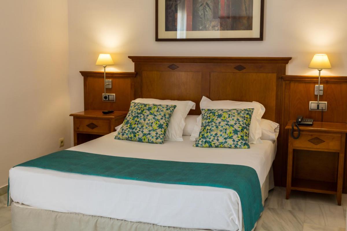 Cama o camas de una habitación en BQ Andalucia Beach Hotel