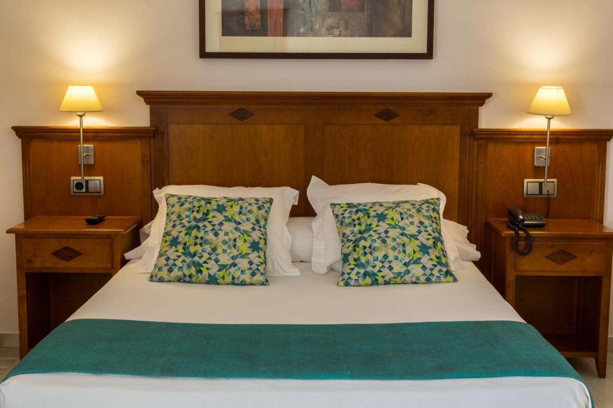 Cama o camas de una habitación en BQ Andalucia Beach Hotel