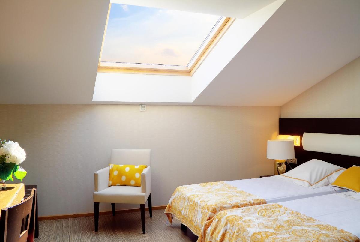 Cama o camas de una habitación en Oca Palacio De La Llorea Hotel & Spa