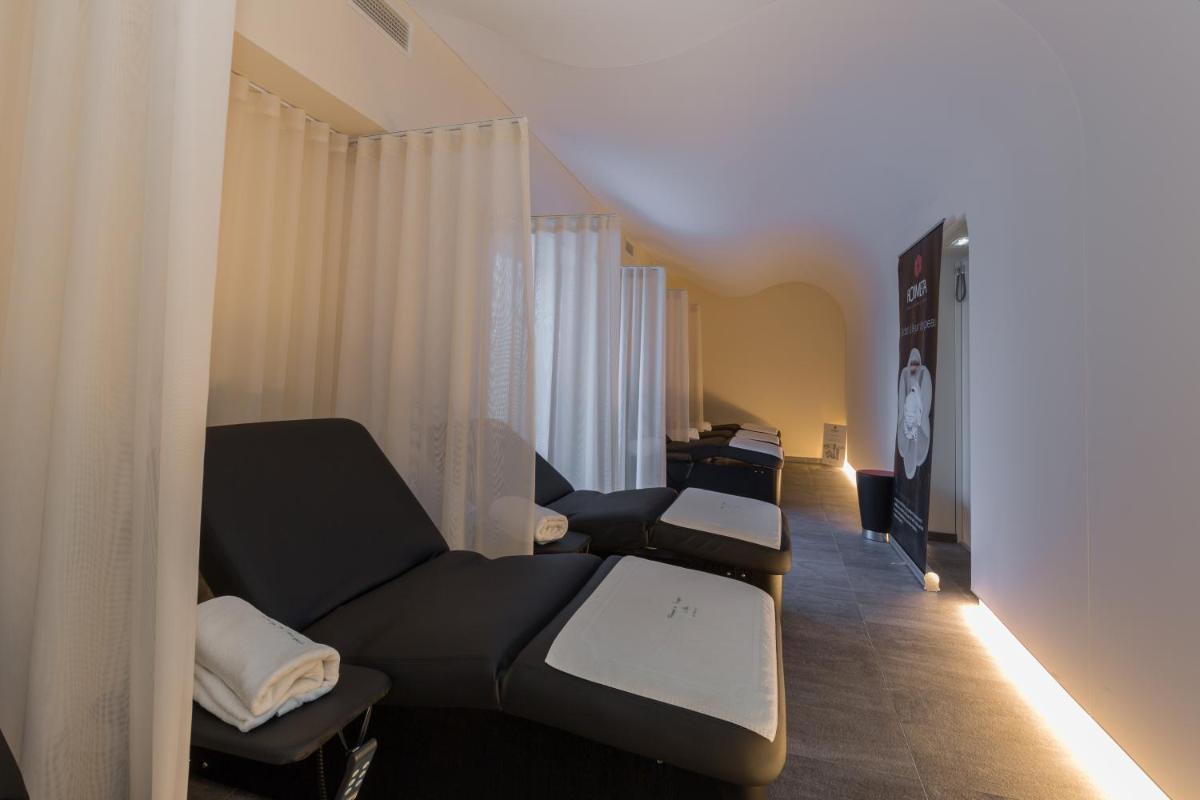 Coin salon dans l'établissement Auberge de Cassagne & Spa
