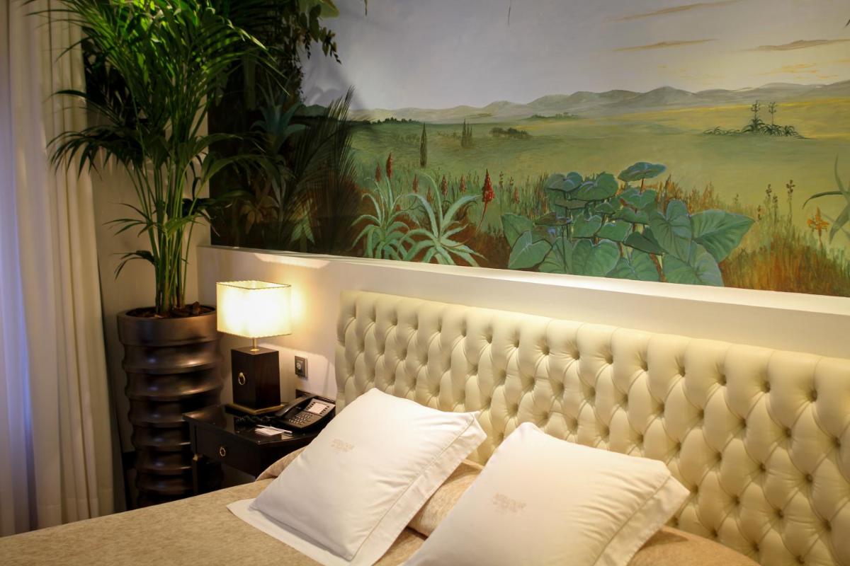 Cama o camas de una habitación en Mirador de Dalt Vila-Relais & Chateaux