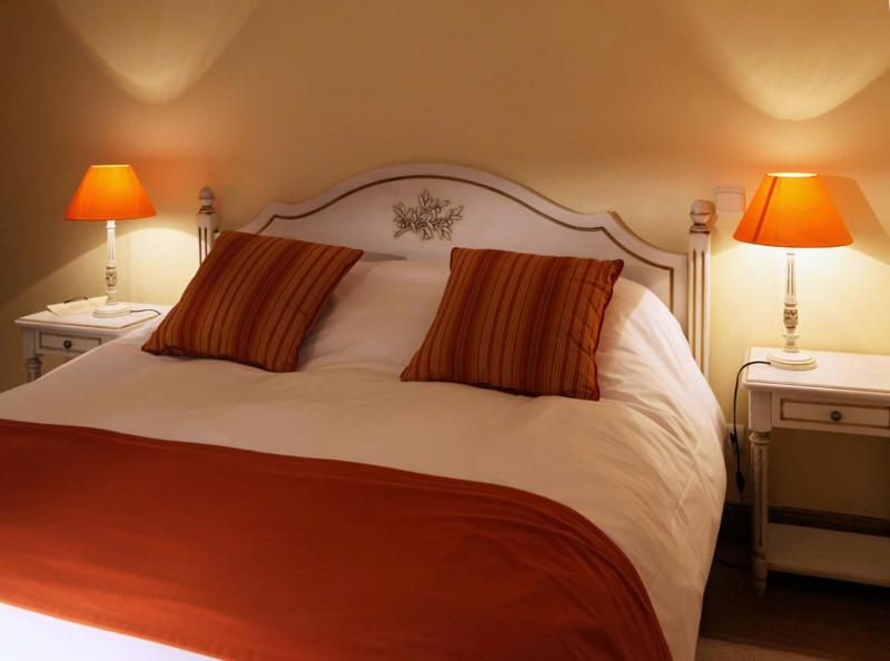 Un ou plusieurs lits dans un hébergement de l'établissement Domaine Saint-Roch Hotel Spa