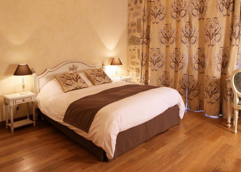 Un ou plusieurs lits dans un hébergement de l'établissement Domaine Saint-Roch Hotel Spa